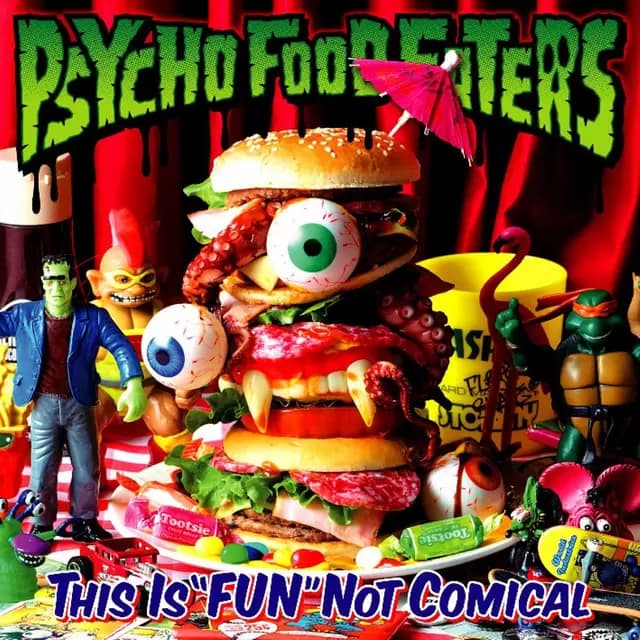 A bright, technicolour burger with single eyeballs in the middle, tentacles and fangs along with a model of Frankenstein’s monster and Teenage Mutant Ninja Turtles.