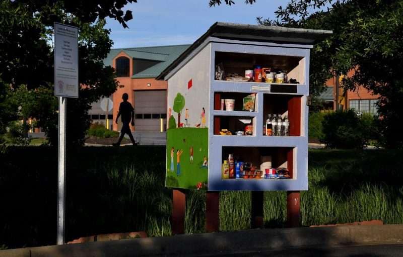 The Little Free Pantry in the parking lot of the Lexington Park library is easily accessible to people in cars as well as pedestrians. © Michael S. Williamson The Washington Post