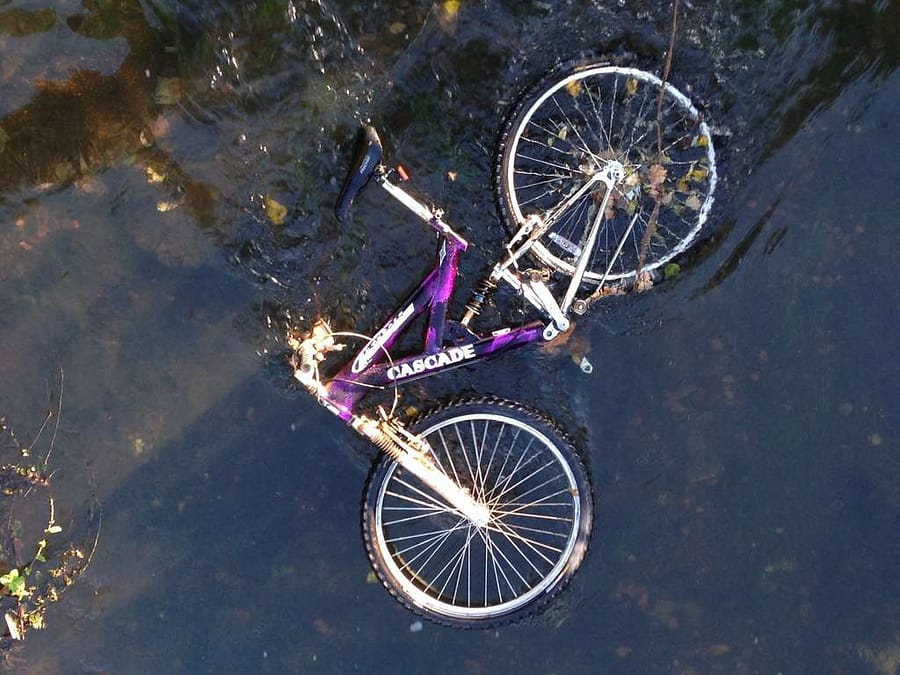 Abandoned bike in water