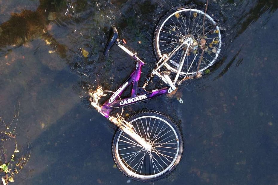 Abandoned bike in water