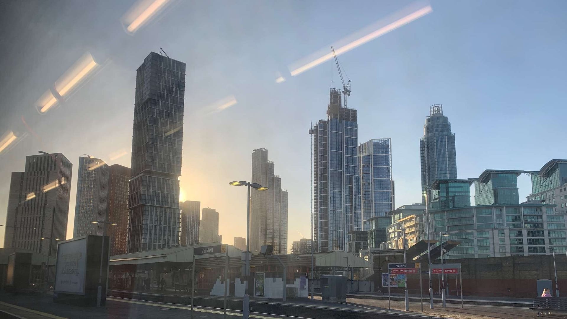 A view from Vauxhall station across the platforms from a train; the ugly high-rise kleptocrat buildings for them to wash their stolen money dominate the skyline. Burn it down, burn it all down.