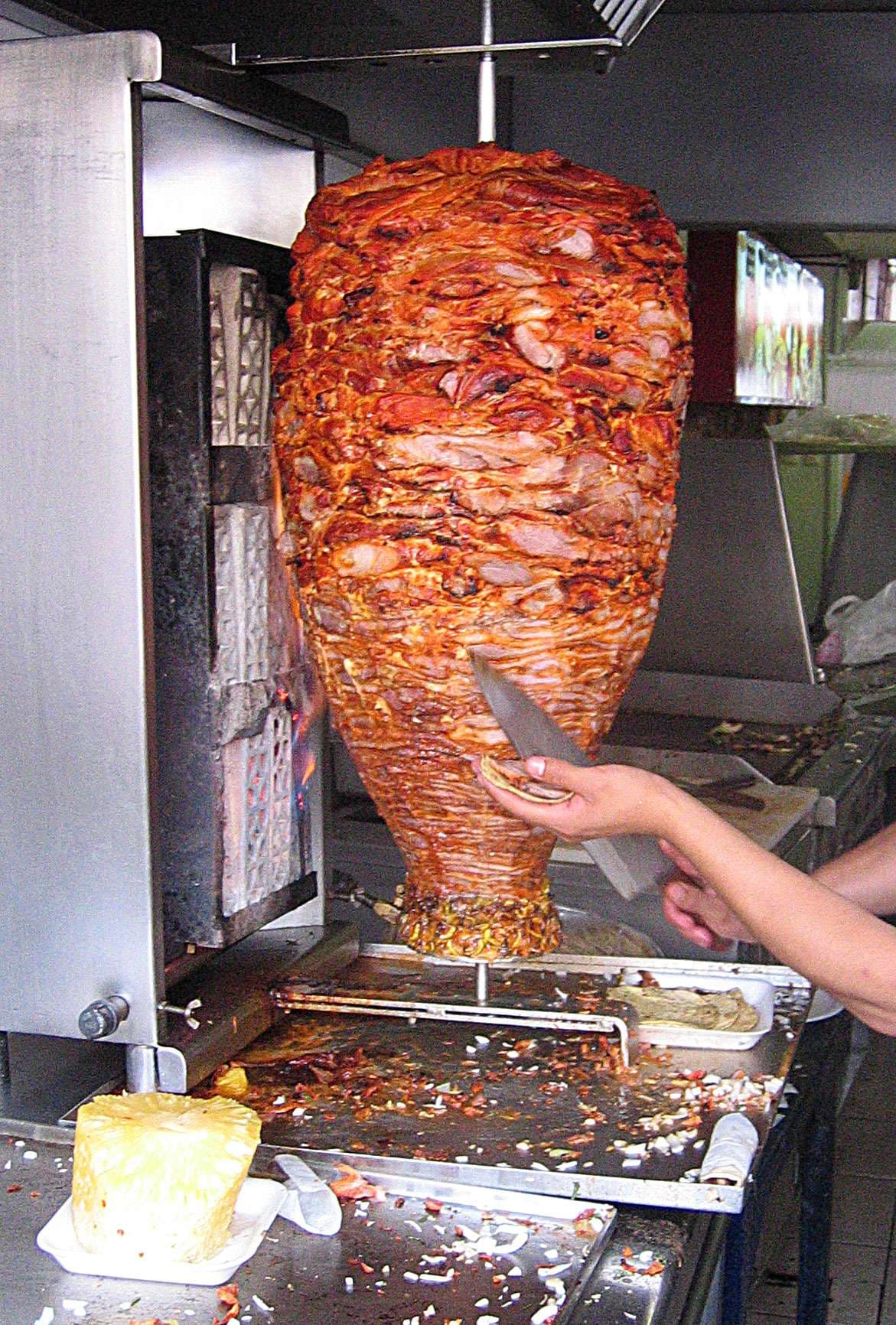 Tacos al Pastor being cut from the spit (uncropped version visible on Flickr) Date 22 May 2006 Source Own work Author Matt Saunders