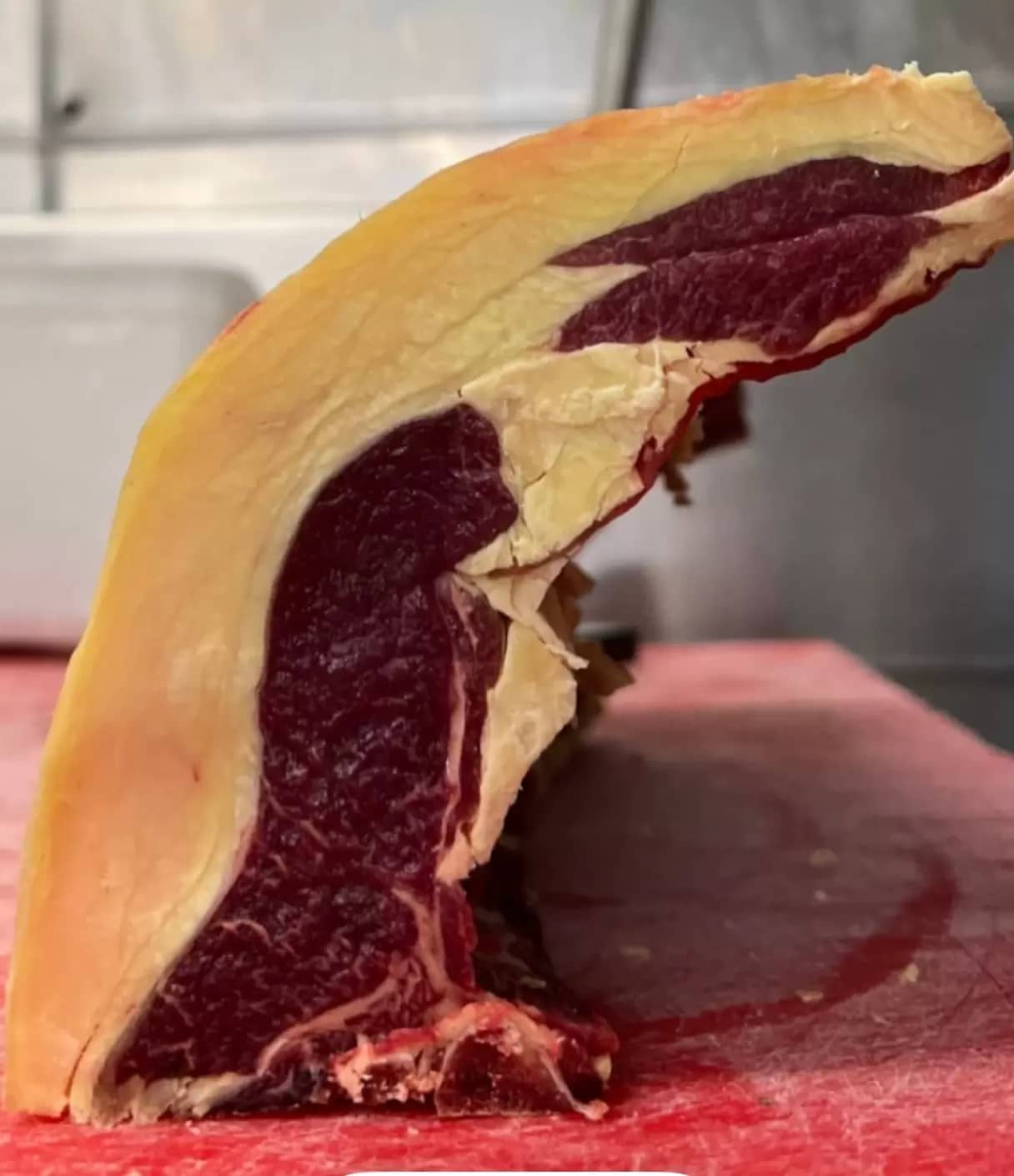 Inside every old UK sheep there is potentiality a world class bit of meat. This one has retained the genes that make pigments go yellow when fed grass. Dark, dark red meat. Fat like butter. Aged to perfection. Not much marbling. Sent to @Mangal2 a let’s see what they do with it!