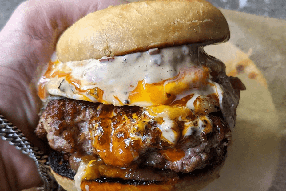 The most amazing burger in a bun combination that I think I've ever eaten. This towering beauty by Jackson Boxer was one of the highlights of my lunch at his restaurant Brunswick House. Layers and layers of flavour, colour, texture and smell. This simple description doesn't do it justice but hopefully, you bet the idea? PIG BUN minced shoulder & belly of middlewhite pig & smoked prosciutto patty blood sausage fried egg grilled comte dill pickles XO mayonnaise made from smoked pork collar, scallop roe & shiitake mushrooms date & tamarind ketchup